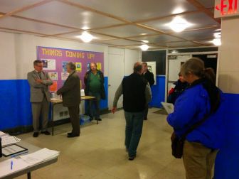 Residents wait for the open house to begin at 6pm