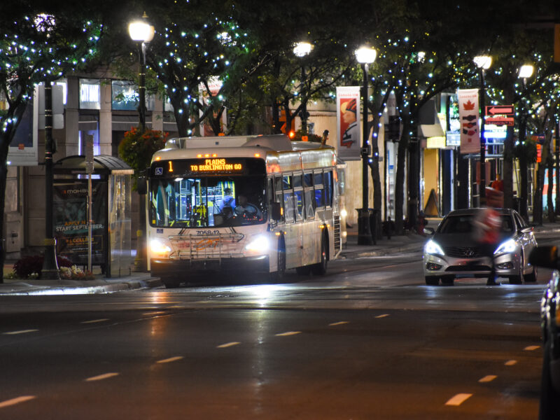 A Burlington Transit bus in Downtown Hamilton at night. Generic photo for illustrative purposes