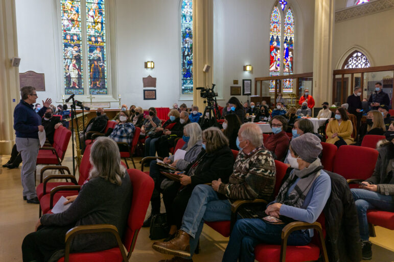 Interior of the Anglican Cathedral during the April 1, 2022 HATS public information session with attendees gathered to hear about the tiny shelter proposal.